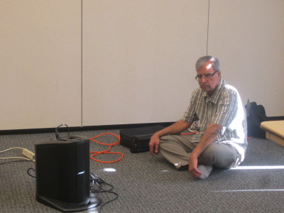 Ravi monitors the sound system